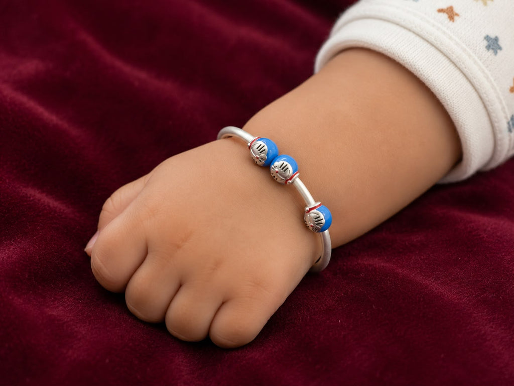 Silver Baby Kada with Blue Character Beads